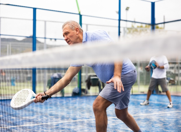 old man playing tennis by vcpt